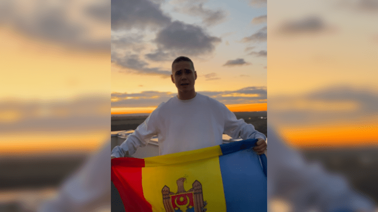 VIDEO Satoshi, vocea reprezentativă a tinerilor, îi îndeamnă să voteze, ținând drapelul: „Ne vedem în viitor”